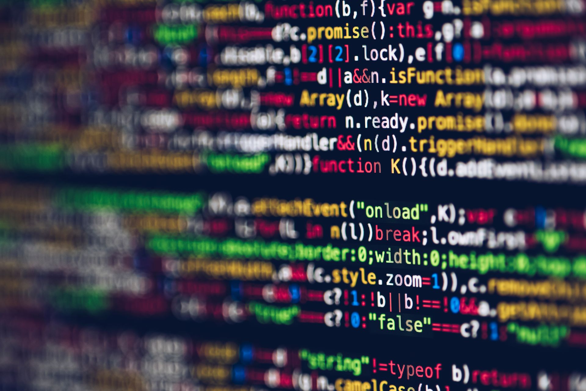 深色屏幕上彩色的 JavaScript 函数与 Promise 代码